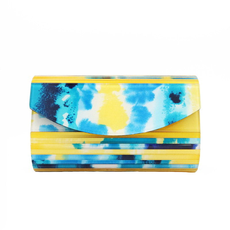 Clutch Tabhita Duck Azul. Amarillo y Blanco