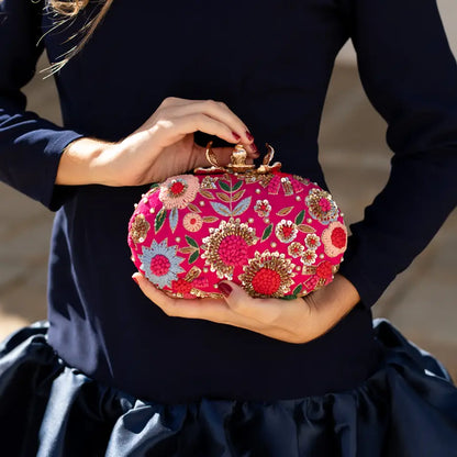 Bolso Ovalado Flor Garra Kali Fucsia
