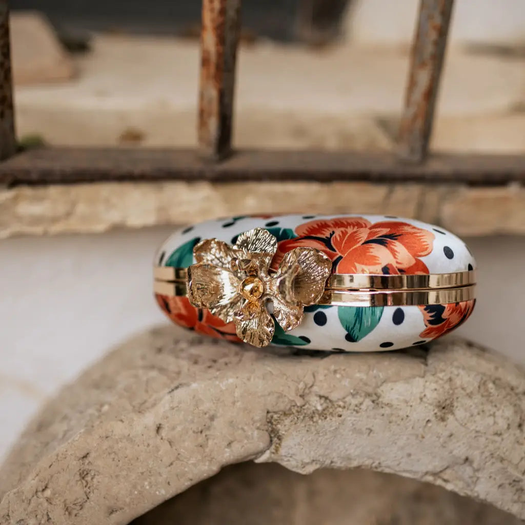 Bolso Ovalado Flor Garra Print Art Lunares Blanco, Negro y Rojo