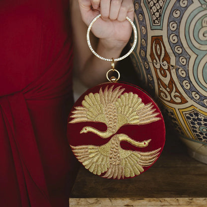 Bolso Circular Duo Gruyas Rojo y dorado