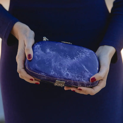 Clutch Ovalado Aguas Plata Morado (con imperfecciones)