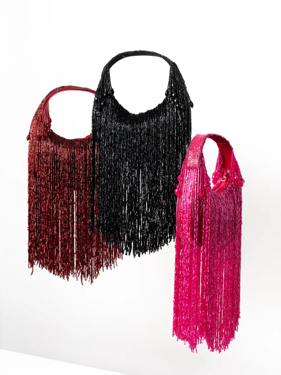 Bolso Asa Surco Flecos Fucsia